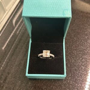 Gorgeous engagement ring; 925 sterling silver w/certified moissanite diamond